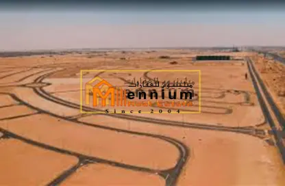 أرض - استوديو للبيع في روضة القرط - ضاحية الروضات - الشارقة
