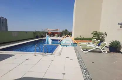 صورة لـ حوض سباحة شقة - 2 غرف نوم - 2 حمامات للايجار في 3 مدينة الواحة - مدينة الواحة - واحة السيليكون - دبي ، صورة رقم 1