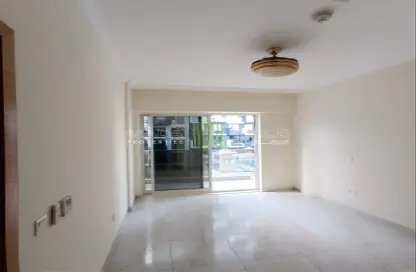Empty Room image for: Apartment - 1 Bedroom - 2 Bathrooms for rent in Dar Al Jawhara - Jumeirah Village Circle - Dubai, Image 1