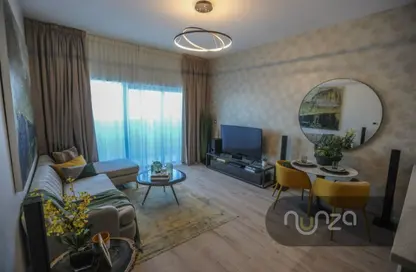 Living Room image for: Apartment - 2 Bedrooms - 2 Bathrooms for sale in Azizi Aura - Downtown Jebel Ali - Dubai, Image 1