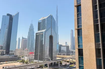 شقة - غرفة نوم - 2 حمامات للايجار في برج المريخي - شارع الشيخ زايد - دبي