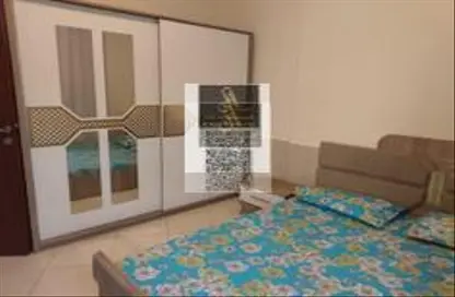 شقة - غرفة نوم - 2 حمامات للايجار في أورينت تاور 1 - أورينت تاور - البستان - عجمان