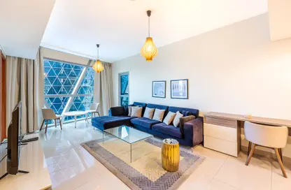 Living Room image for: Apartment - 1 Bedroom - 1 Bathroom for rent in Park Tower A - Park Towers - DIFC - Dubai, Image 1