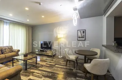 Living / Dining Room image for: Apartment - 1 Bedroom - 2 Bathrooms for rent in Damac Heights - Dubai Marina - Dubai, Image 1