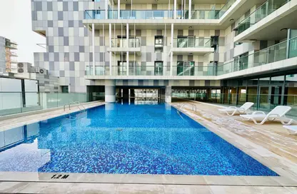 Pool image for: Apartment - 2 Bedrooms - 3 Bathrooms for rent in Al Raha Lofts - Al Raha Beach - Abu Dhabi, Image 1