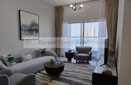 Living Room image for: Apartment - 2 Bedrooms - 2 Bathrooms for sale in Gulf Tower - Emirates City - Ajman, Image 1