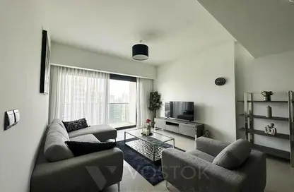 Living Room image for: Apartment - 2 Bedrooms - 2 Bathrooms for rent in Act Towers - Opera District - Downtown Dubai - Dubai, Image 1