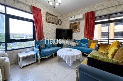 Living Room image for: Apartment - 2 Bedrooms - 2 Bathrooms for sale in Al Sidir 1 - Al Sidir - Greens - Dubai, Image 1