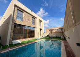 Villa - 5 bedrooms - 7 bathrooms for sale in Ajman Global City - Al Alia - Ajman