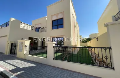 Outdoor House image for: Villa - 4 Bedrooms - 5 Bathrooms for rent in Nad Al Sheba Villas - Nad Al Sheba 3 - Nad Al Sheba - Dubai, Image 1