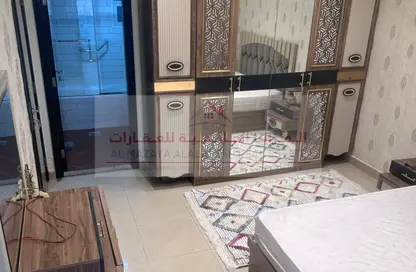 شقة - غرفة نوم - 2 حمامات للايجار في برج منازل 5 - شارع التعاون - التعاون - الشارقة
