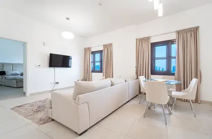 Living / Dining Room image for: Apartment - 1 Bedroom - 2 Bathrooms for sale in Al Andalus Tower C - Al Andalus - Jumeirah Golf Estates - Dubai, Image 1