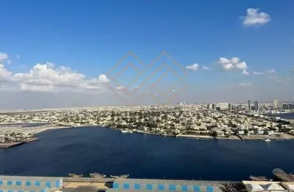 شقة - غرفة نوم - 2 حمامات للايجار في أورينت تاور 1 - أورينت تاور - البستان - عجمان