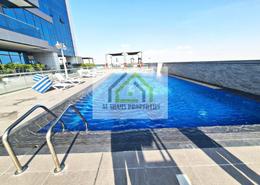 Pool image for: Apartment - 1 bedroom - 2 bathrooms for rent in Orchid Residence - Dubai Science Park - Dubai, Image 1