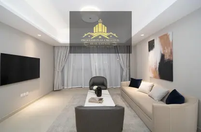 Living Room image for: Apartment - 3 Bedrooms - 4 Bathrooms for sale in AZHA Community - Al Amerah - Ajman, Image 1