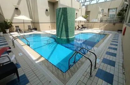 صورة لـ حوض سباحة دوبلكس - 3 غرف نوم - 4 حمامات للايجار في شارع النجدة - أبوظبي ، صورة رقم 1