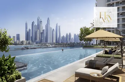 Pool image for: Apartment - 2 Bedrooms - 3 Bathrooms for sale in Palace Beach Residence - EMAAR Beachfront - Dubai Harbour - Dubai, Image 1