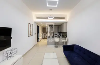 Living / Dining Room image for: Apartment - 1 Bedroom - 2 Bathrooms for sale in Rigel - Jumeirah Village Circle - Dubai, Image 1