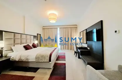 Room / Bedroom image for: Apartment - 1 Bathroom for rent in Siraj Tower - Arjan - Dubai, Image 1