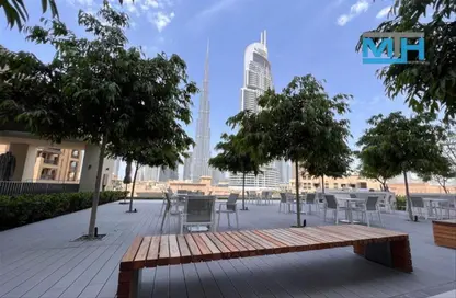 Outdoor Building image for: Apartment - 1 Bedroom - 2 Bathrooms for sale in Burj Royale - Downtown Dubai - Dubai, Image 1