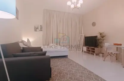 Living Room image for: Apartment - 1 Bathroom for rent in Wavez Residence - Liwan - Dubai Land - Dubai, Image 1