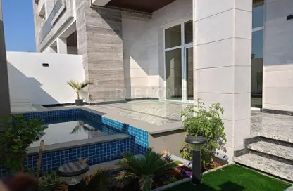 Pool image for: Villa - 5 Bedrooms - 6 Bathrooms for sale in Hoshi 1 - Hoshi - Al Badie - Sharjah, Image 1