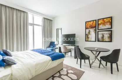 Room / Bedroom image for: Apartment - 1 Bathroom for sale in Golf Veduta A - Golf Veduta Hotel Apartments - DAMAC Hills - Dubai, Image 1