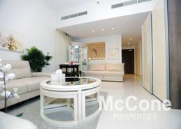Living / Dining Room image for: Apartment - 1 bedroom - 2 bathrooms for rent in Boulevard Crescent 1 - BLVD Crescent - Downtown Dubai - Dubai, Image 1