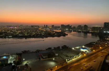 شقة - غرفة نوم - 2 حمامات للايجار في أورينت تاور 1 - أورينت تاور - البستان - عجمان