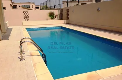 Pool image for: Villa - 6 Bedrooms - 6 Bathrooms for rent in Golf Gardens - Khalifa City - Abu Dhabi, Image 1