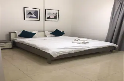 صورة لـ غرفة- غرفة النوم شقة - 2 غرف نوم - 2 حمامات للايجار في آيه جي ٠٣ - دبي الجنوب (مركز دبي العالمي) - دبي ، صورة رقم 1