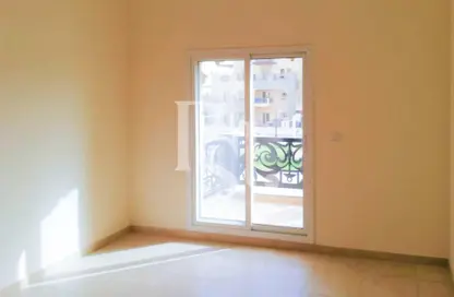 Empty Room image for: Apartment - 1 Bedroom - 1 Bathroom for sale in Al Thamam 63 - Al Thamam - Remraam - Dubai, Image 1