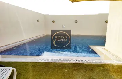 صورة لـ حوض سباحة شقة - غرفة نوم - 1 حمام للايجار في الروضة ريزيدنس سي98 - روضة أبو ظبي - أبوظبي ، صورة رقم 1