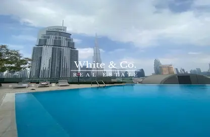 Pool image for: Apartment - 1 Bedroom - 2 Bathrooms for rent in Boulevard Point - Downtown Dubai - Dubai, Image 1