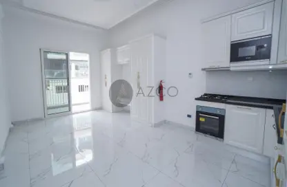 Kitchen image for: Apartment - 1 Bathroom for sale in Vincitore Boulevard - Arjan - Dubai, Image 1