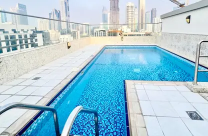 Apartment - 1 Bedroom - 2 Bathrooms for rent in Jumeirah Garden City - Al Satwa - Dubai