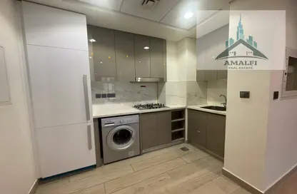 صورة لـ مطبخ شقة - غرفة نوم - 1 حمام للايجار في 18 عزيزي ريفيرا - ميدان واحد - ميدان - دبي ، صورة رقم 1