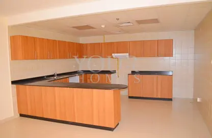 Kitchen image for: Apartment - 1 Bedroom - 2 Bathrooms for sale in Maple 1 - Emirates Gardens 2 - Jumeirah Village Circle - Dubai, Image 1