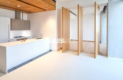 Kitchen image for: Apartment - 1 Bedroom - 2 Bathrooms for sale in KOA Canvas - Mohammad Bin Rashid Gardens - Dubai, Image 1