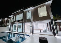 Outdoor House image for: Villa - 5 bedrooms - 6 bathrooms for sale in Sanctuary Falls - Earth - Jumeirah Golf Estates - Dubai, Image 1
