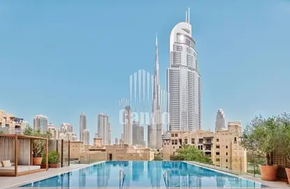 Pool image for: Apartment - 2 Bedrooms - 2 Bathrooms for rent in Burj Royale - Downtown Dubai - Dubai, Image 1