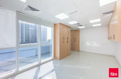 Empty Room image for: Office Space - Studio - 1 Bathroom for sale in The Exchange - Business Bay - Dubai, Image 1