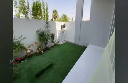 Garden image for: Townhouse - 3 Bedrooms - 3 Bathrooms for rent in Aster - Damac Hills 2 - Dubai, Image 1