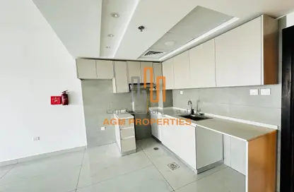 صورة لـ مطبخ شقة - غرفة نوم - 2 حمامات للايجار في 2 المرحلة - المدينة الدولية - دبي ، صورة رقم 1