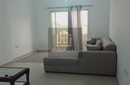 Living Room image for: Apartment - 1 Bedroom - 1 Bathroom for rent in Al Jawhara Building - Al Rawda 3 - Al Rawda - Ajman, Image 1