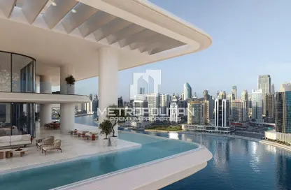 Pool image for: Apartment - 2 Bedrooms - 3 Bathrooms for sale in The Vela Dorchester Collection - Business Bay - Dubai, Image 1