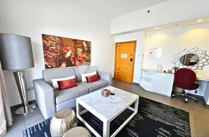 Living Room image for: Apartment - 1 Bedroom - 2 Bathrooms for sale in TFG Marina Hotel - Dubai Marina - Dubai, Image 1