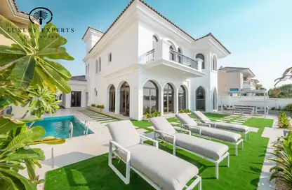 Villa - 6 Bedrooms - 5 Bathrooms for rent in Garden Homes Frond E - Garden Homes - Palm Jumeirah - Dubai