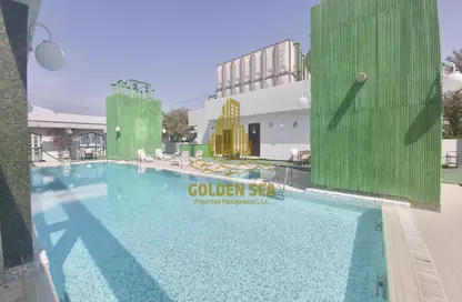 صورة لـ حوض سباحة شقة - 2 غرف نوم - 2 حمامات للايجار في برج اللؤلؤة - شارع إلكترا - أبوظبي ، صورة رقم 1