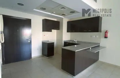 Kitchen image for: Apartment - 1 Bathroom for rent in Al Thamam 16 - Al Thamam - Remraam - Dubai, Image 1